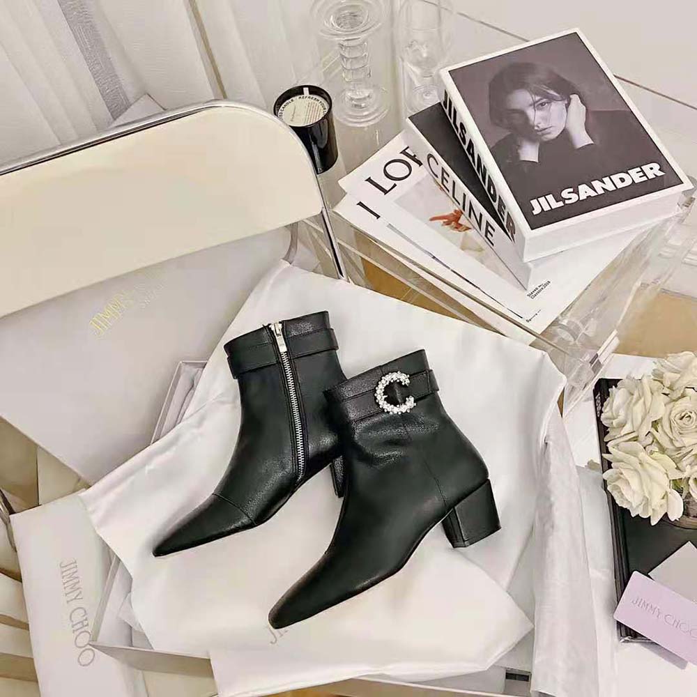 Front angle showcasing silhouette of Jimmy Choo Women Myan 45 ankle boots