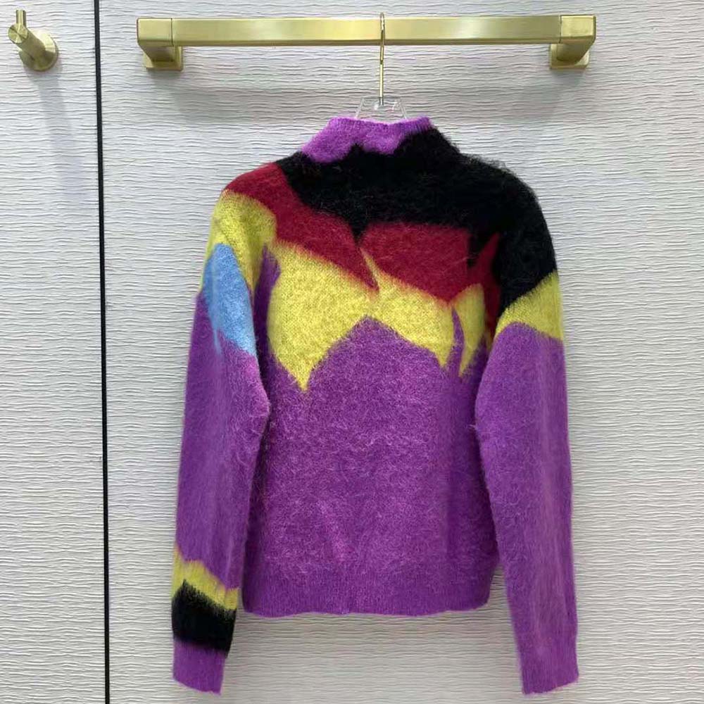 Side angle showing relaxed fit and turtle neck of Loewe sweater