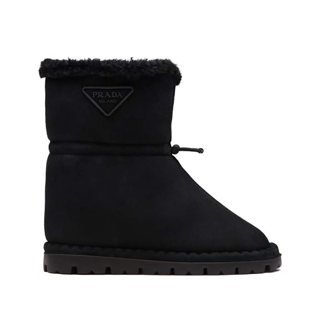 Side view of Prada Women Classic Snow Boot Shearling Booties-Black