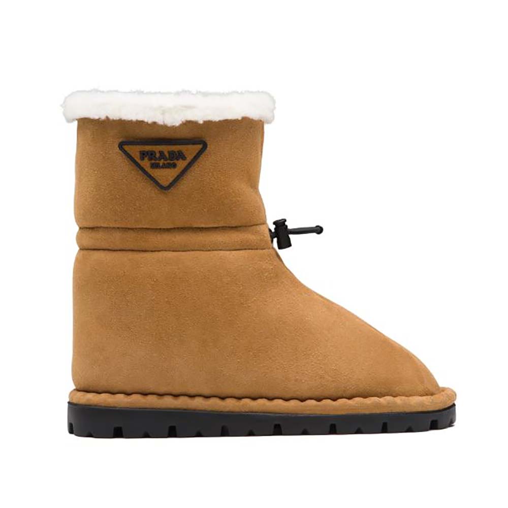 Side view of Prada Women Classic Snow Boot Shearling Booties in brown