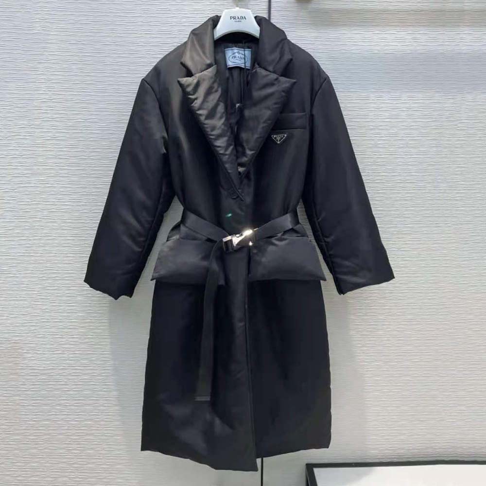 Close-up of signature Prada black hardware and zip closure detail