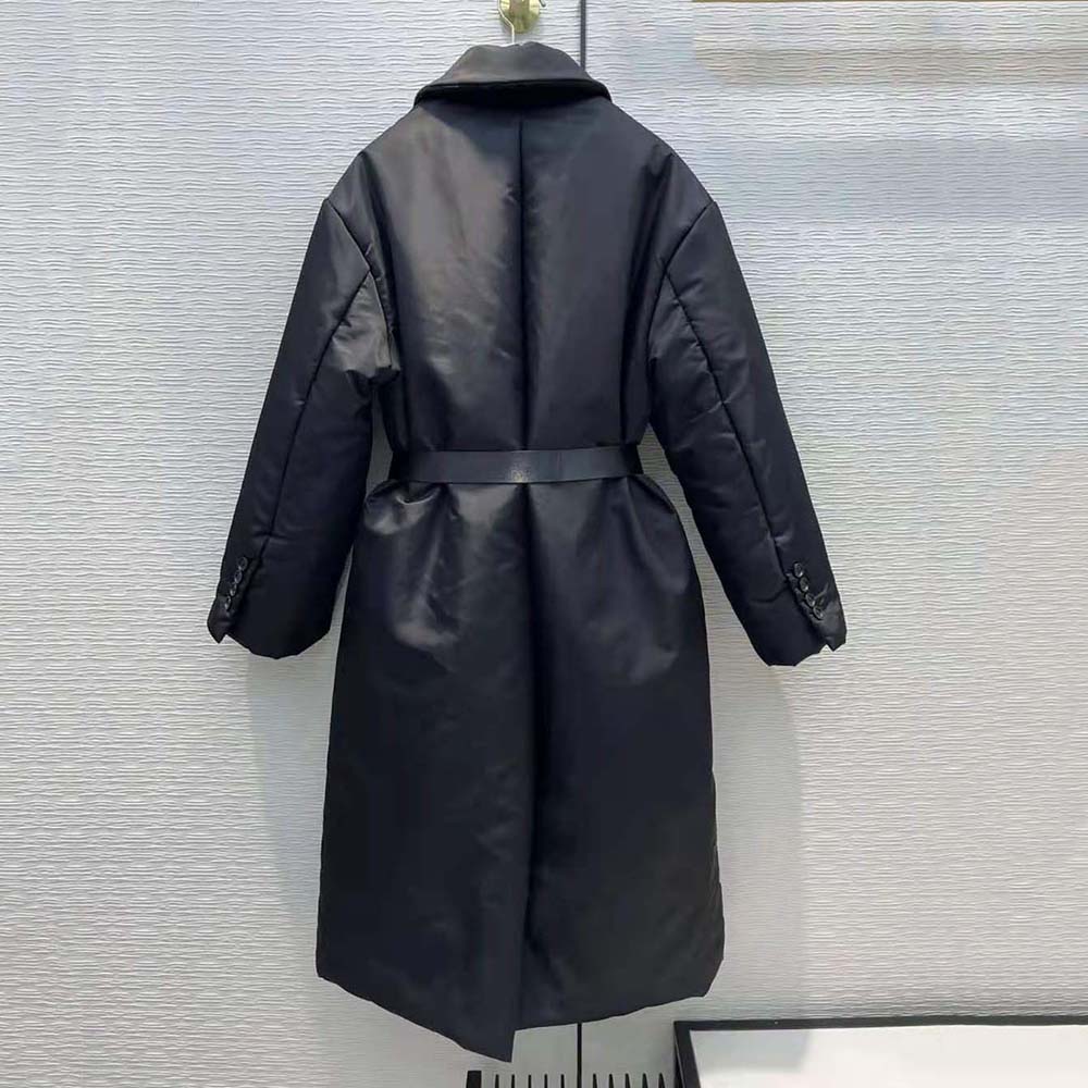 Side angle showing relaxed fit of Prada Women Re-Nylon Down Coat