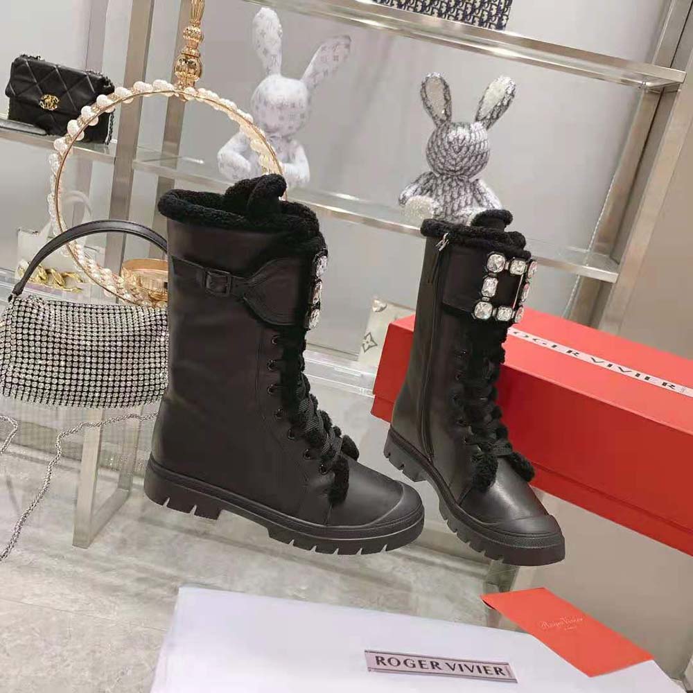 Close-up of crystal strass buckle on Roger Vivier Walky Viv’ Shearling Boots