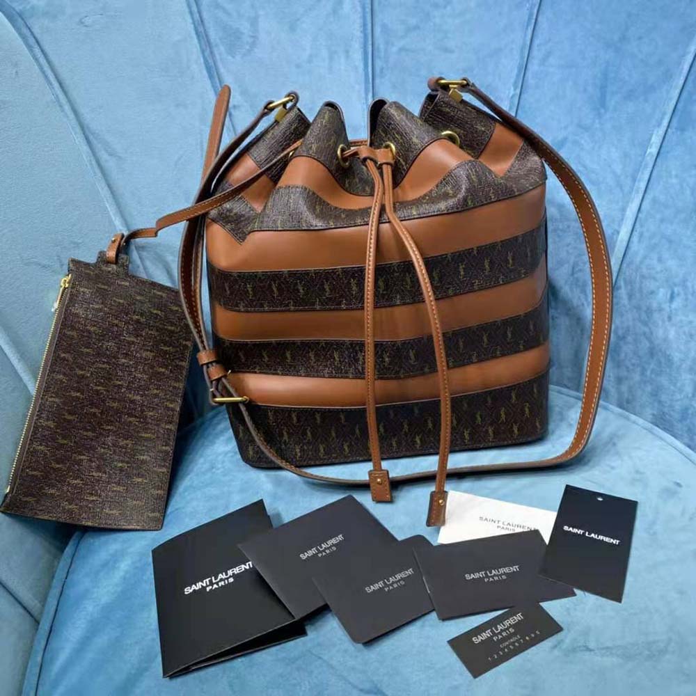 Close-up of Saint Laurent YSL Women LE Monogramme Bucket Bag gold hardware and monogram