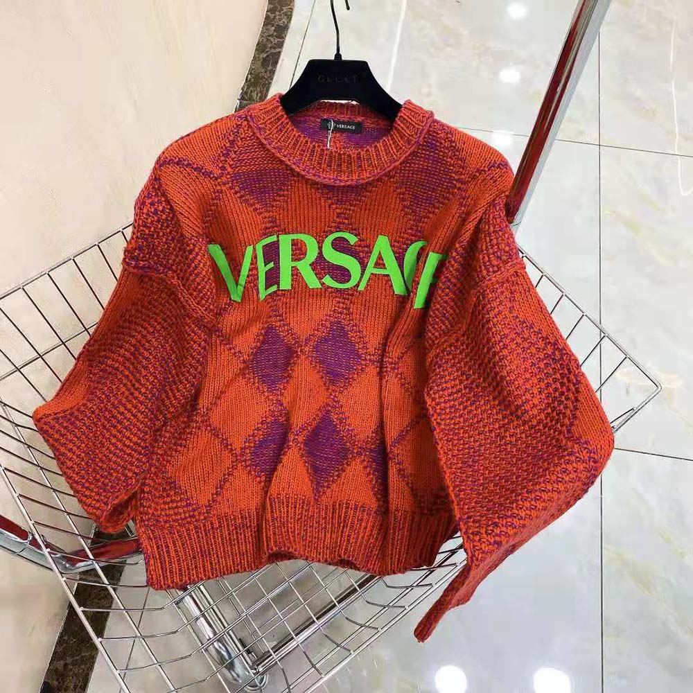 Side angle showing silhouette of Versace Women Logo Argyle Wool and Alpaca Sweater
