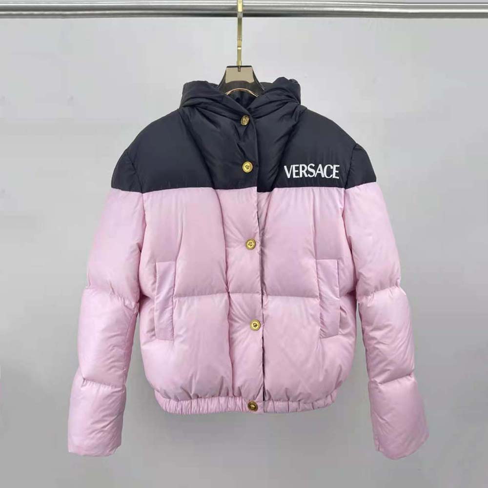 Close-up of gold Medusa logo hardware on Versace Women Logo Puffer Jacket-Pink