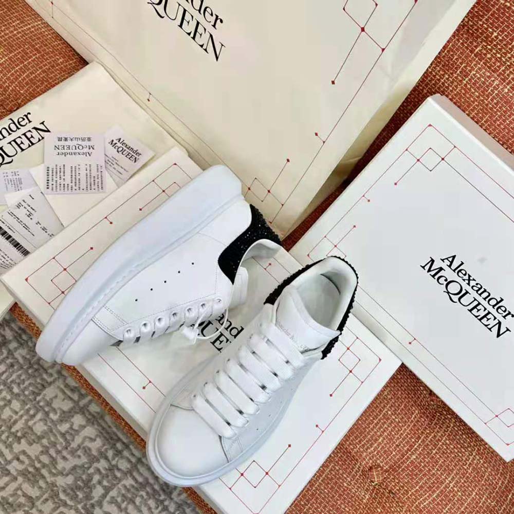 Overhead view showcasing laces and chunky sole of Alexander Mcqueen sneaker