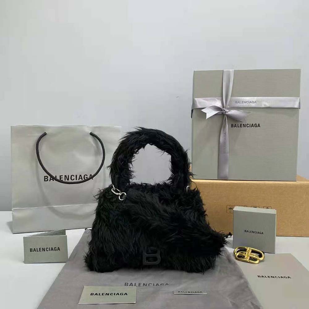 Side view showing structured silhouette of Balenciaga Women Fluffy Hourglass Bag