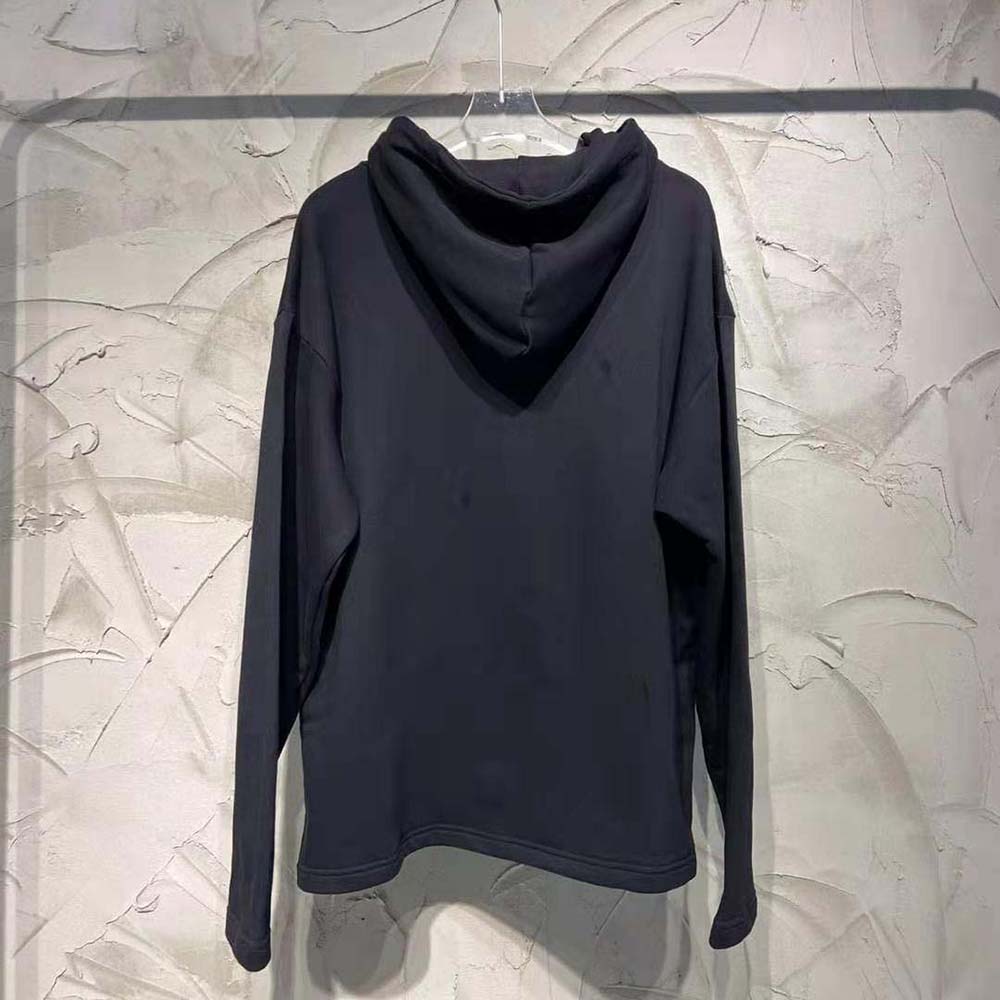 Side angle showing cropped fit of Balenciaga Women Simpsons Tm and 20th Television Cropped Hoodie