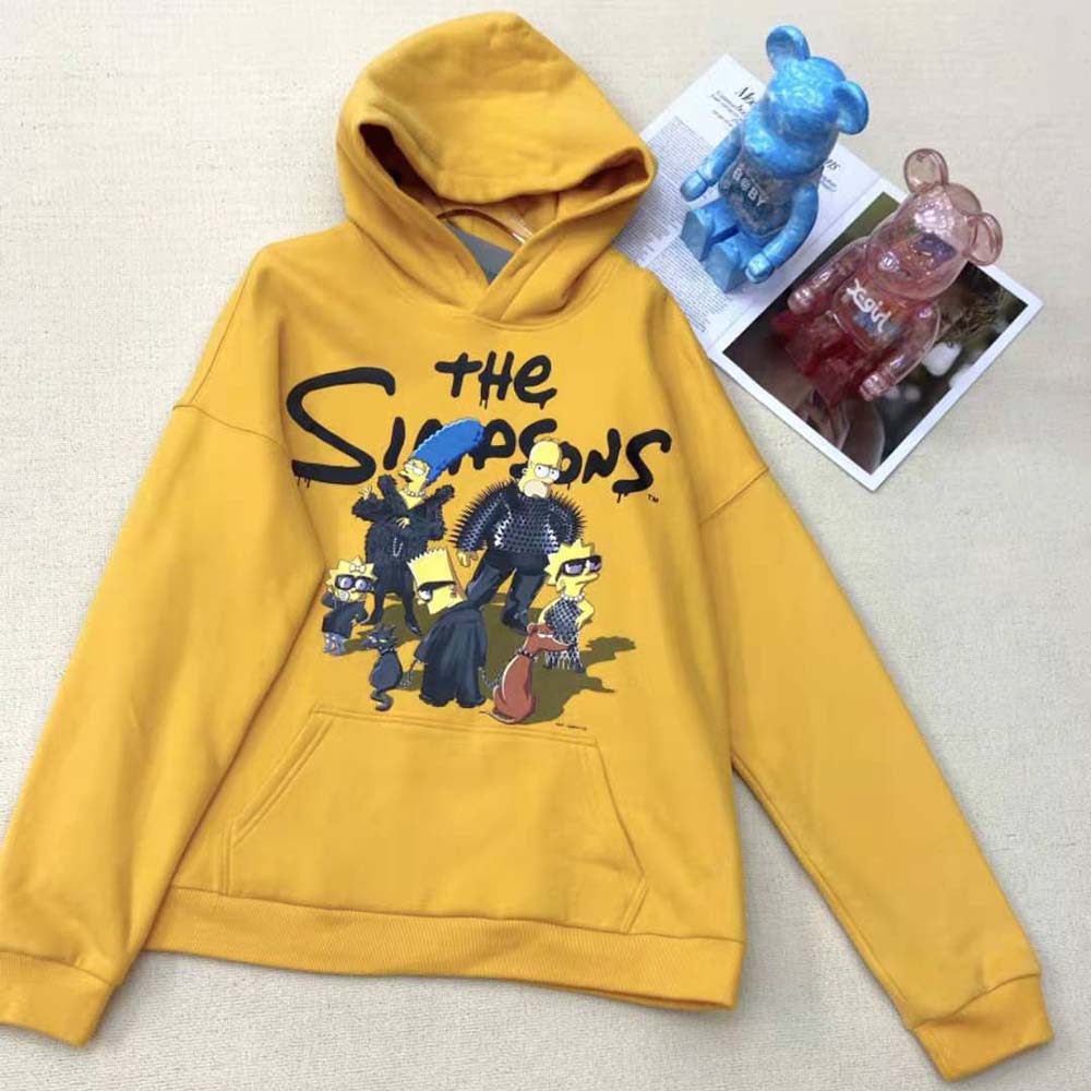 Close-up of signature Simpsons and 20th Television logos on yellow hoodie
