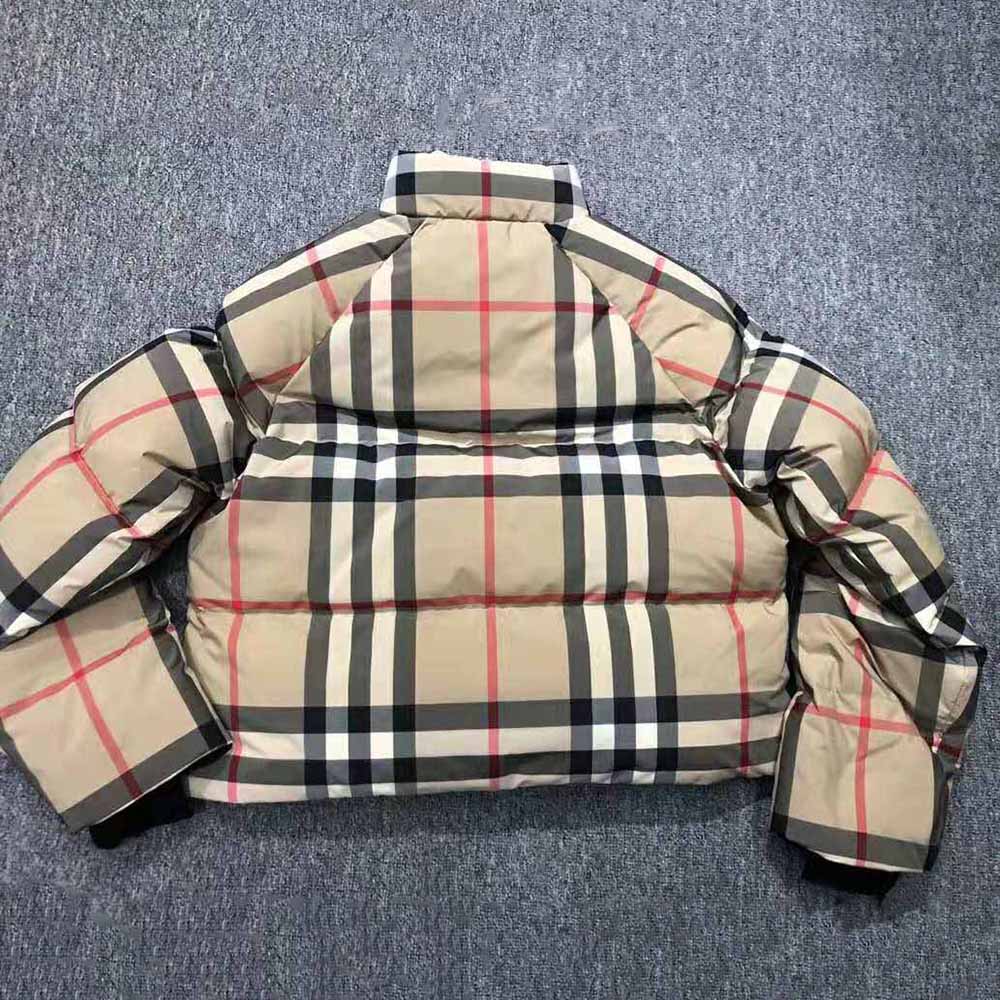 Side angle showing zip closure and silhouette of Burberry Women Check Cropped Puffer Jacket