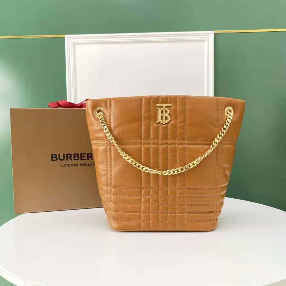 Close-up of gold-tone Lola chain hardware on Burberry brown bag