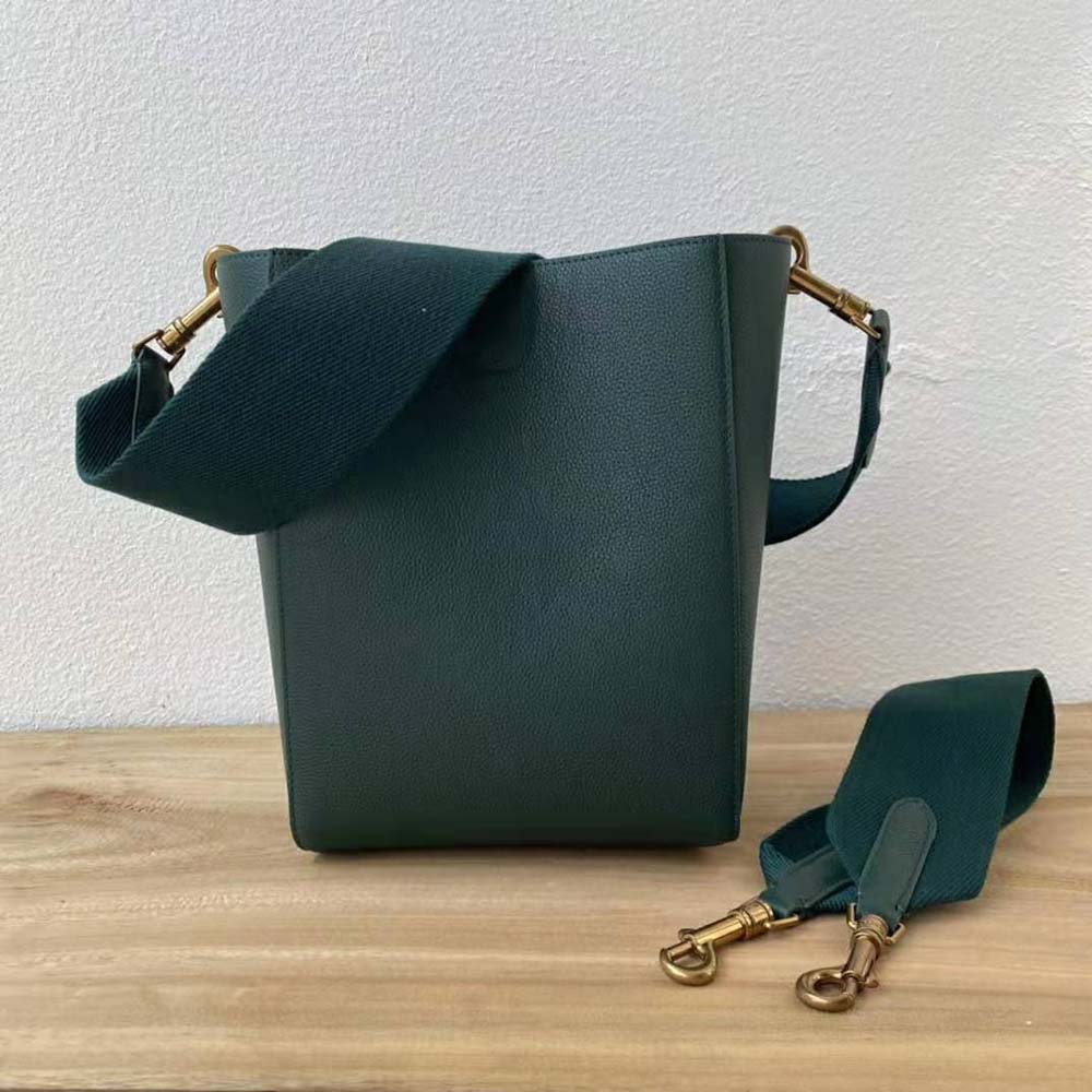 Side angle showing adjustable shoulder strap on Celine Women Sangle Small Bucket Bag