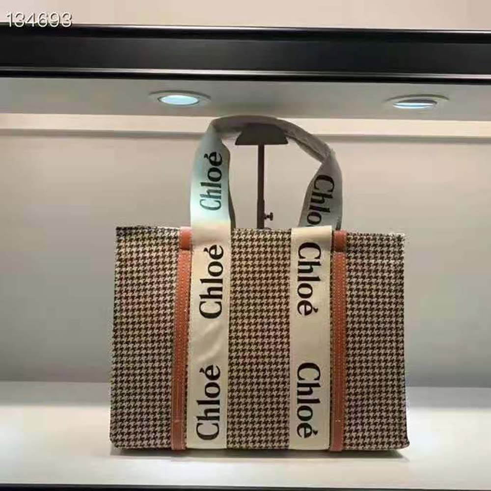 Close-up of Chloe Woody Tote Bag’s gold hardware and leather trim