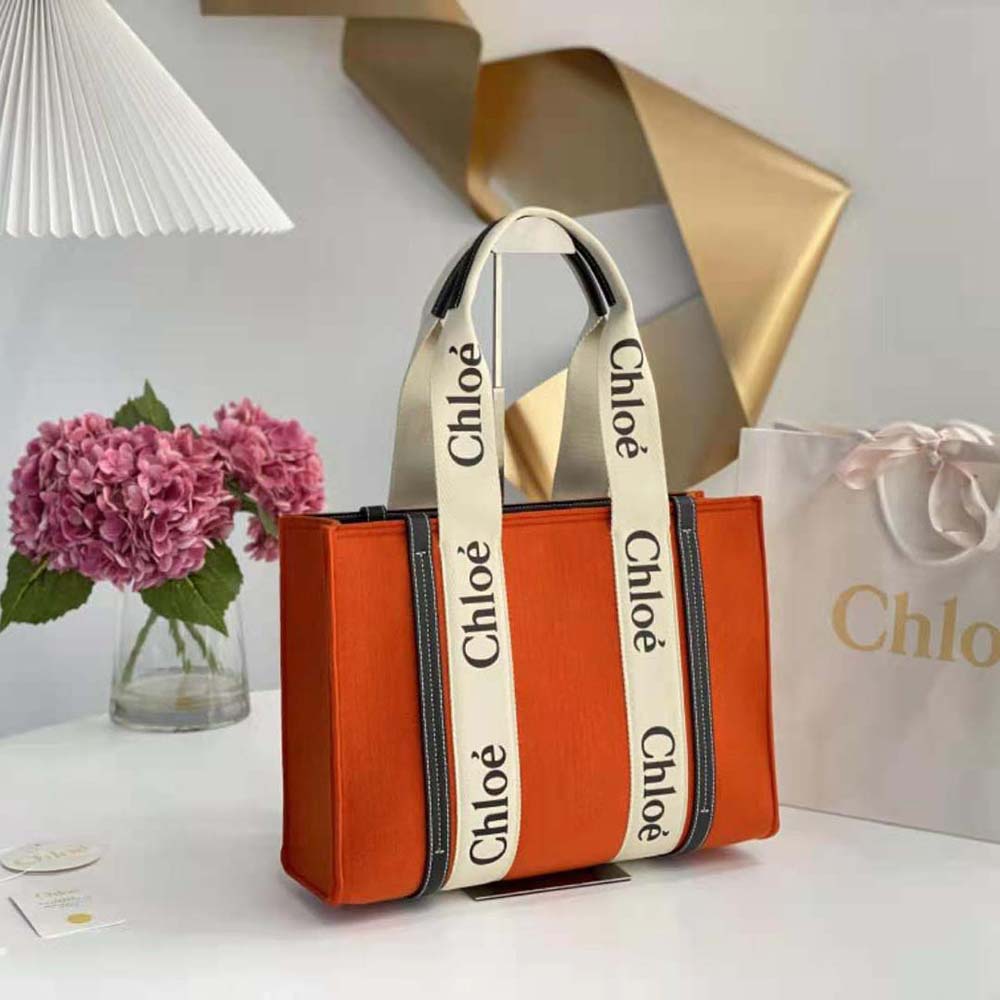 Gold-tone hardware and signature charm on Chloe Medium Woody Tote Bag