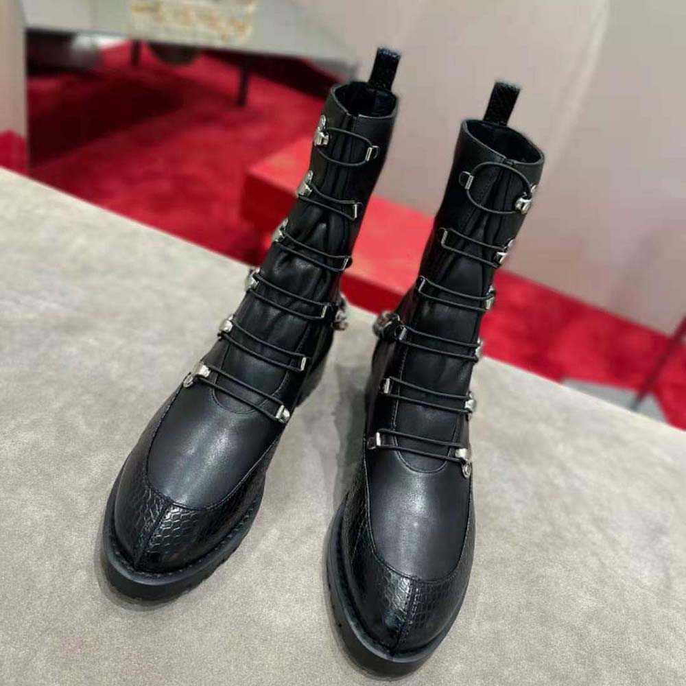 Close-up of signature red sole on Christian Louboutin Women Horse Guarda Flat