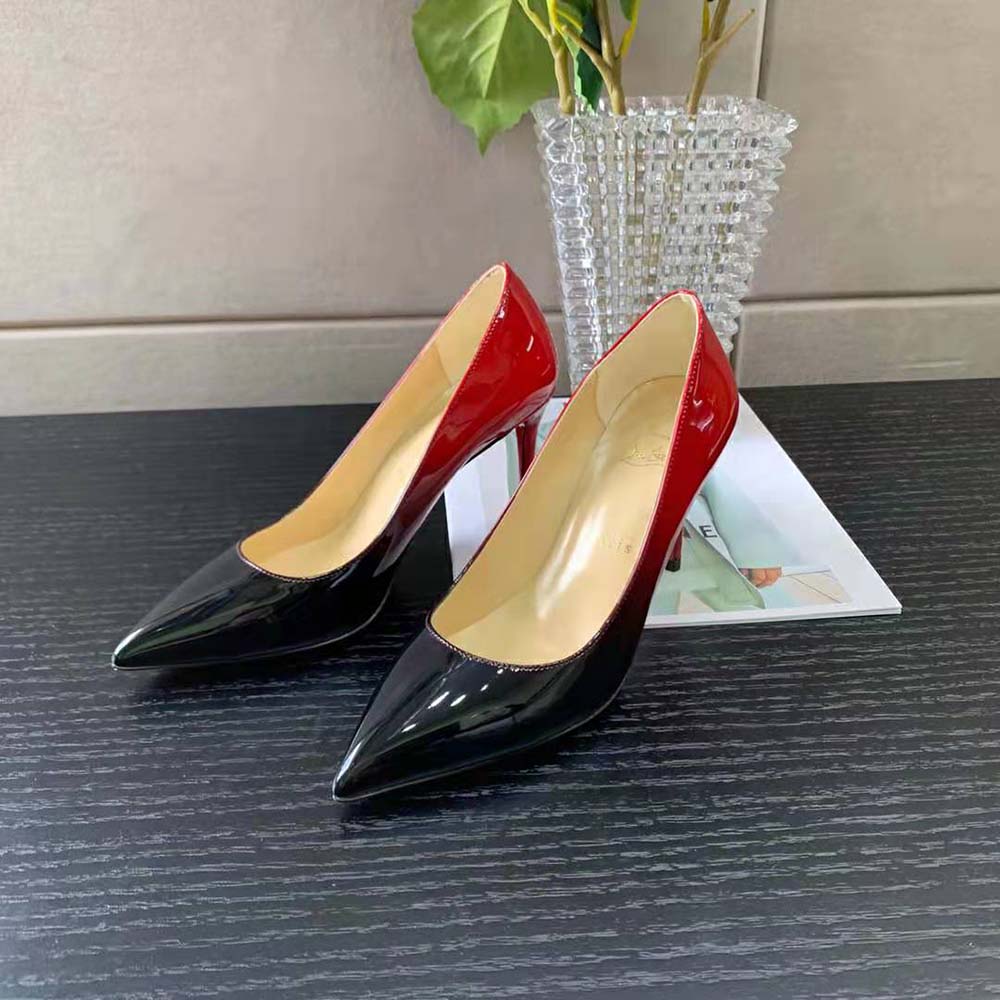 Close-up of glossy red patent leather and buckle on Christian Louboutin Women Kate