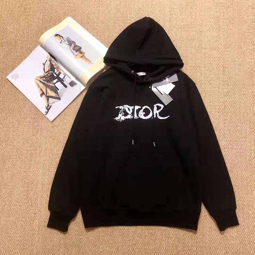 Side angle showing relaxed fit of Dior Men Peter Doig Hooded Sweatshirt