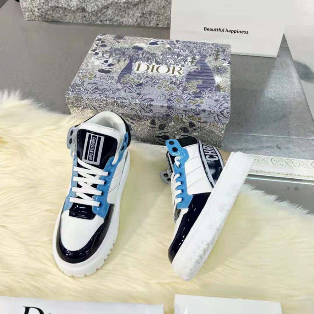 Overhead view showing signature Dior branding on blue multicolor sneaker