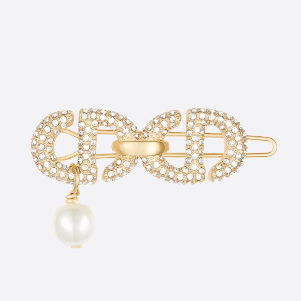 Close-up of Dior Women CD Navy Barrette gold-finish metal and crystals