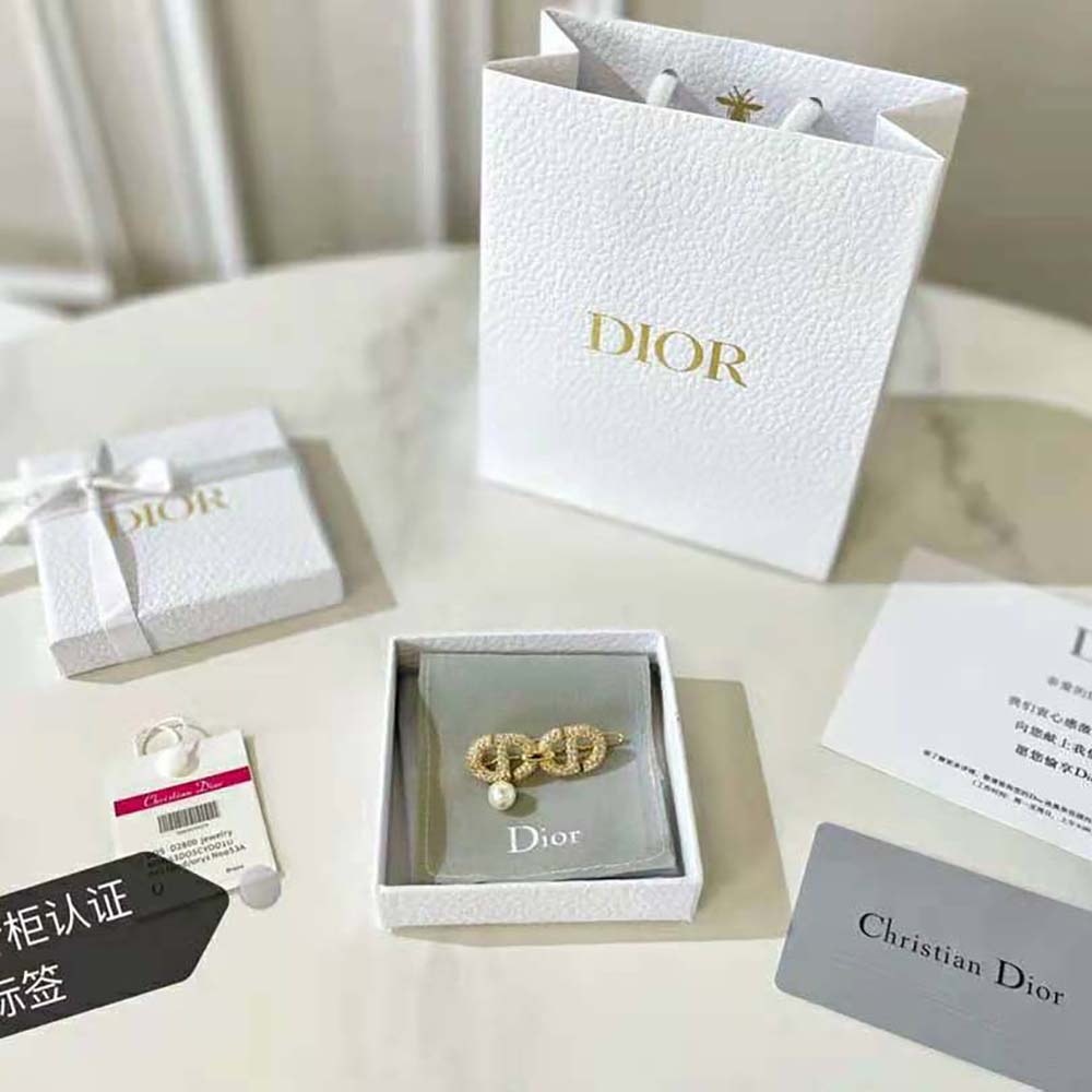 Side view showing clasp and signature CD detail on Dior Women CD Navy Barrette