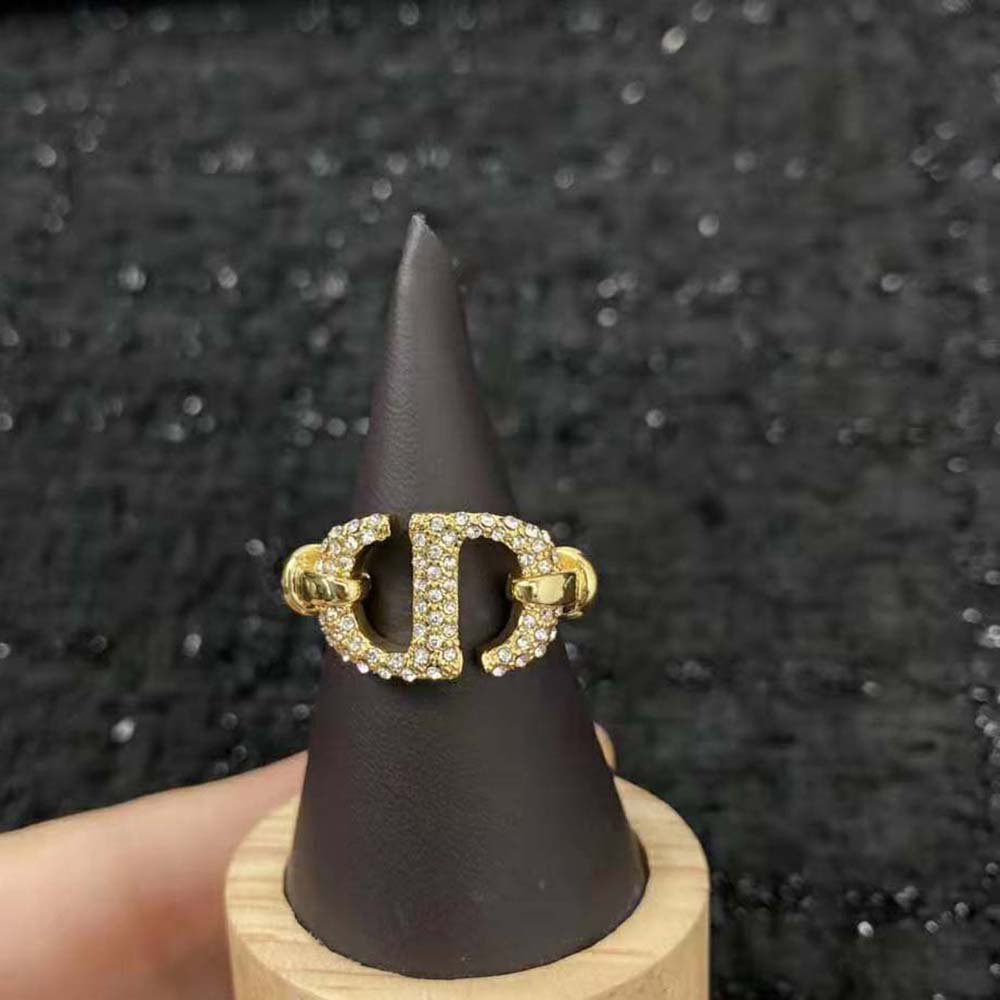 Top-down detail of sparkling crystals on Dior Women CD Navy Ring gold finish