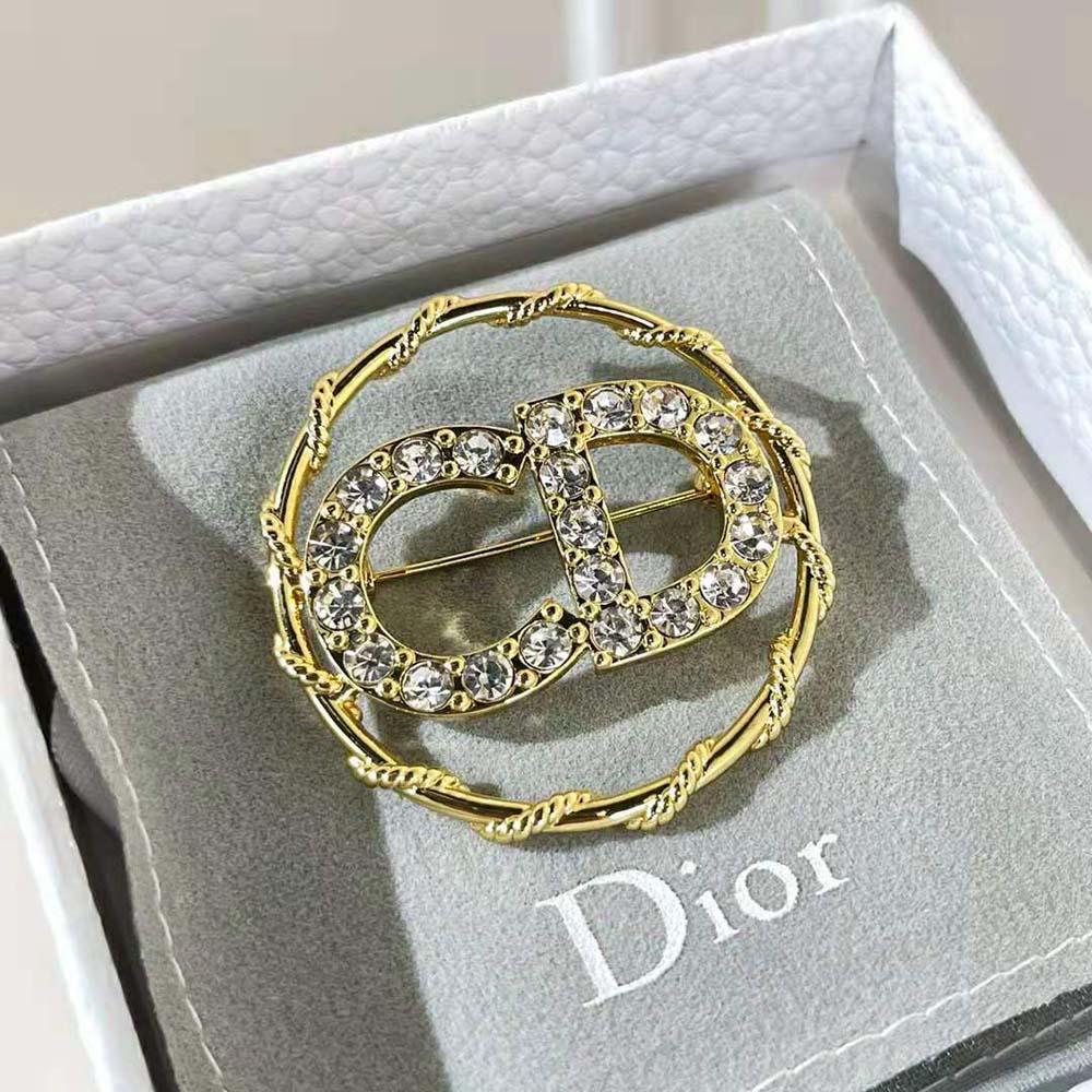 Side angle showing clasp and gold finish on Dior Women Clair D Lune Brooch