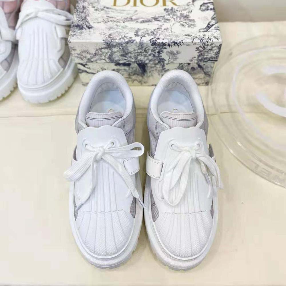 Close-up of reflective fabric and silver hardware on Dior Women Dior-id Sneaker