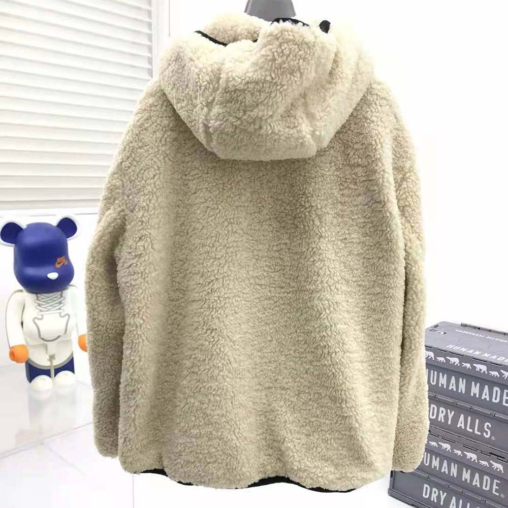 Side angle showing relaxed fit of Dior Women Hooded Anorak Ecru Fleece
