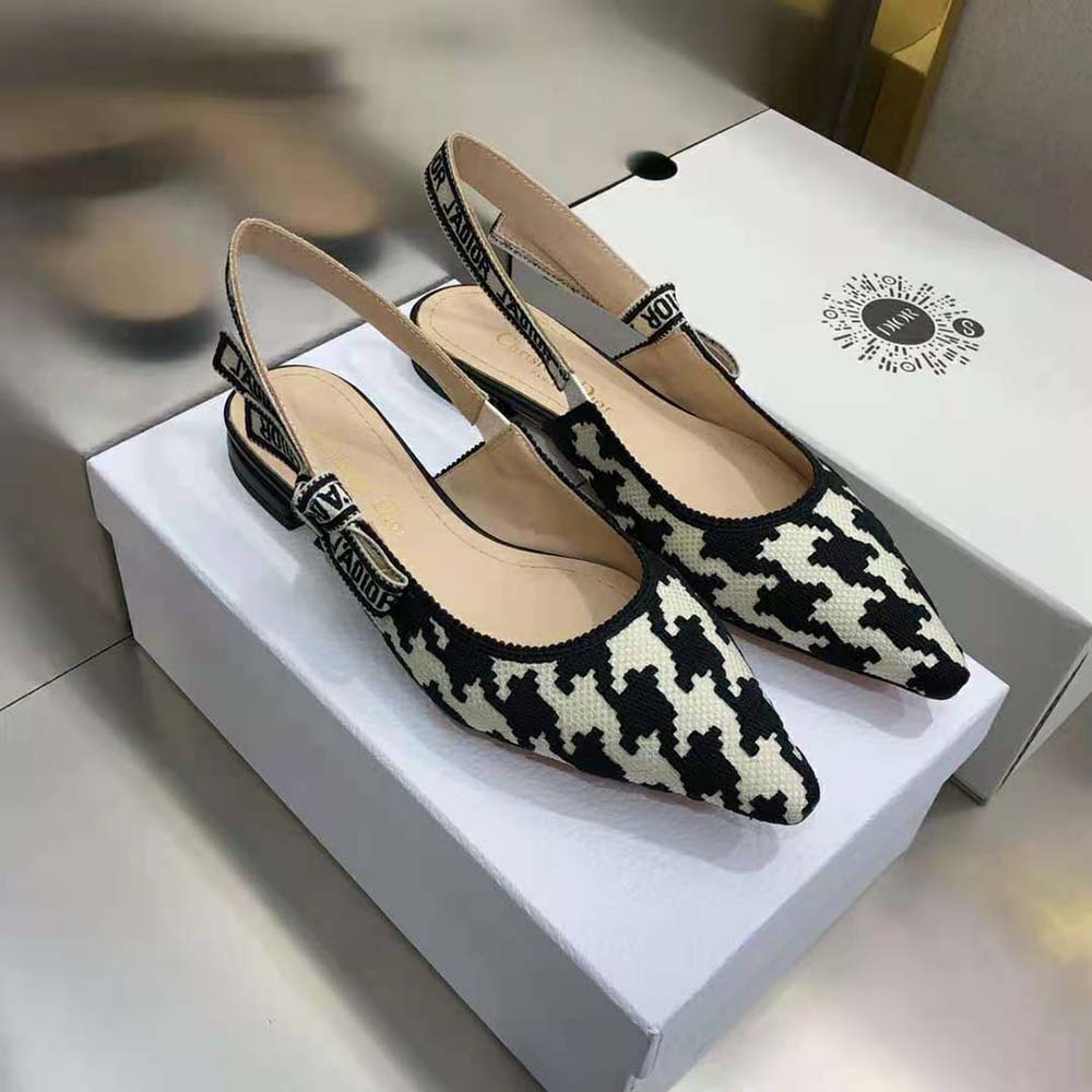 Close-up of J’Adior metal logo on Dior Women J’Adior Ballerina Flat