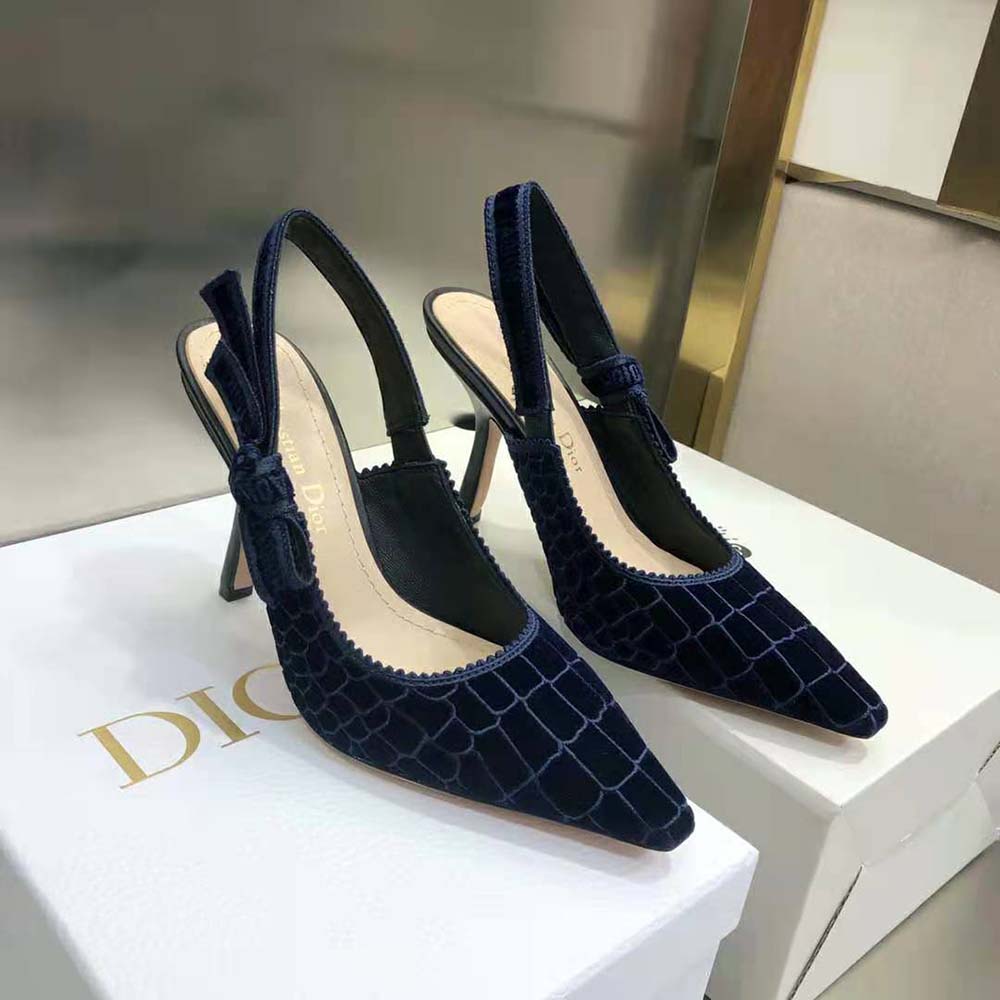 Rear angle showing slingback strap and heel of Dior embroidered velvet pump