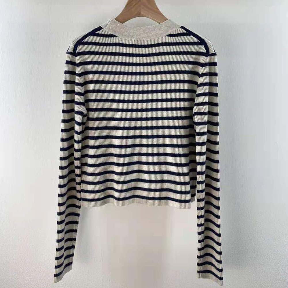Side angle showing slim fit of Dior Women Mariniere Buttoned Cardigan