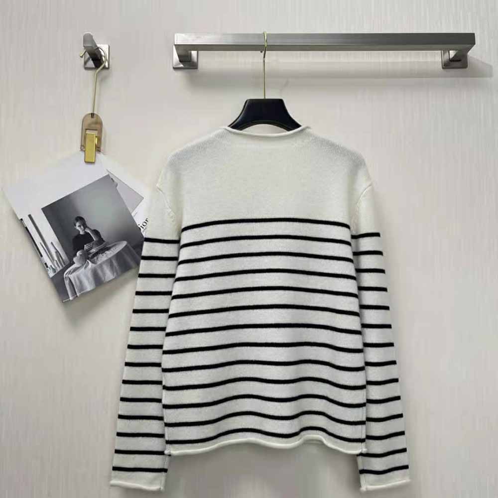 Side angle showing relaxed fit of Dior Women Mariniere Embroidered Sweater