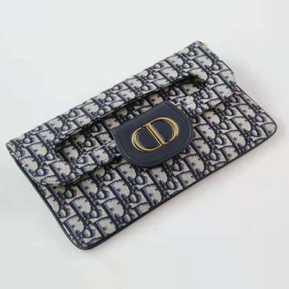 Side angle showing magnetic closure of Dior Women Medium Diordouble Bag