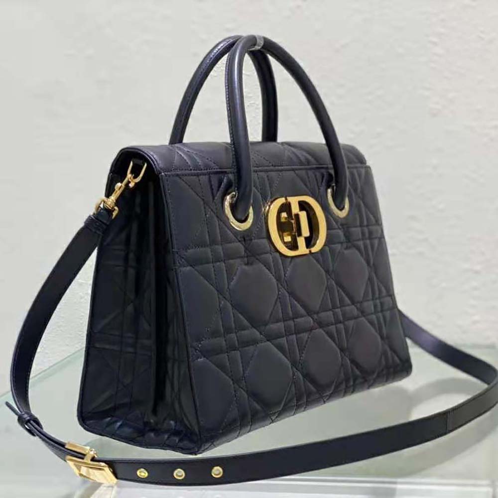 Side angle showing silver-tone hardware on Dior Women Medium ST Honore Tote