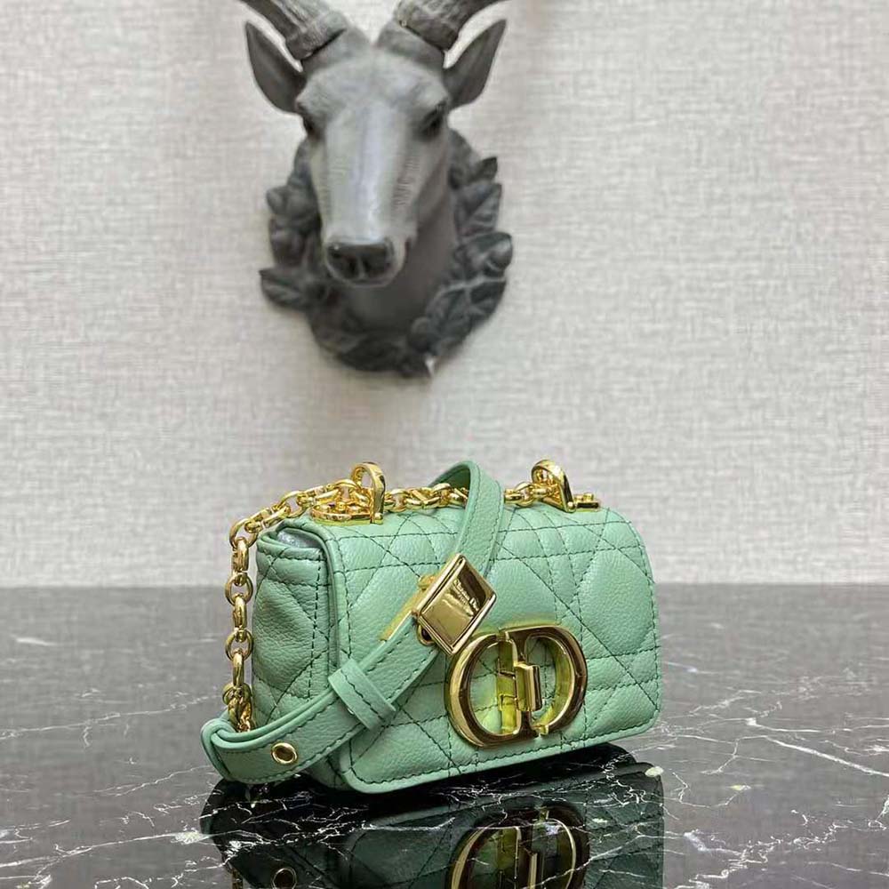 Side view showing slim profile of Dior Women Micro Dior Caro Bag