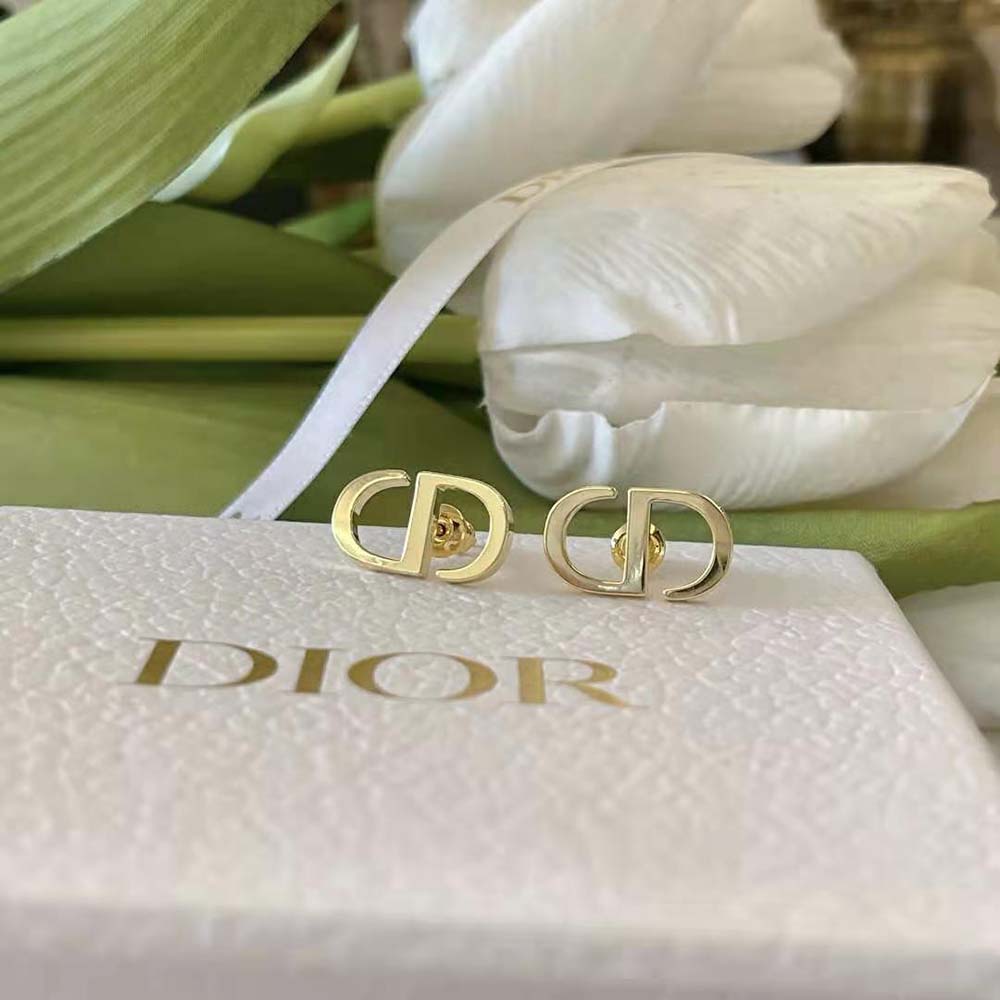 Side angle showing push-back closure on Dior Women Petit CD Studs Earrings