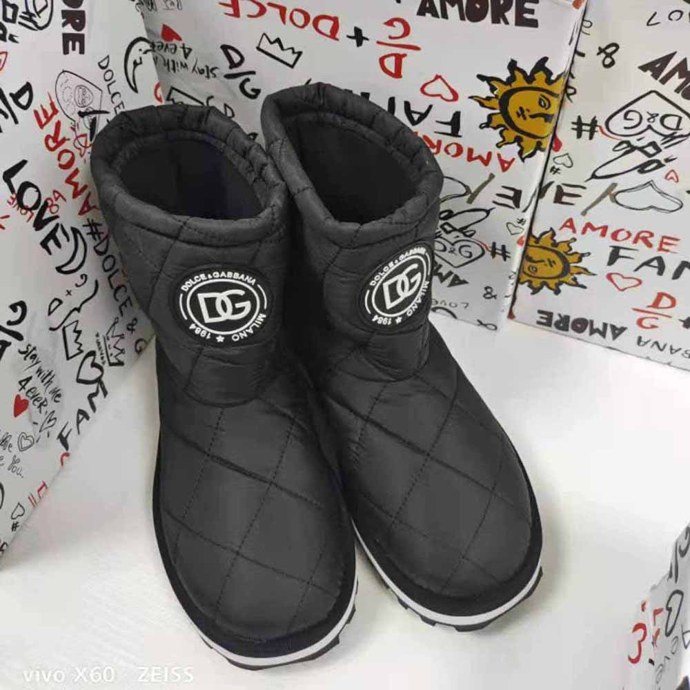 Close-up of DG logo hardware on Dolce Gabbana D&G nylon ankle boots