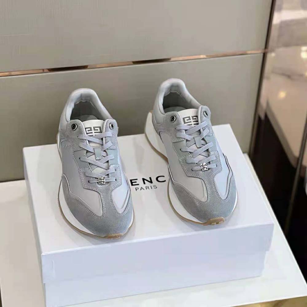 Close-up of signature Givenchy branding on heel of Giv Runner Sneakers