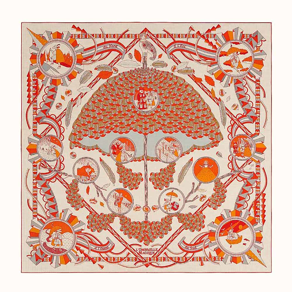 Hermes Women L’ombrelle Magique Shawl 140 folded showing orange silk texture