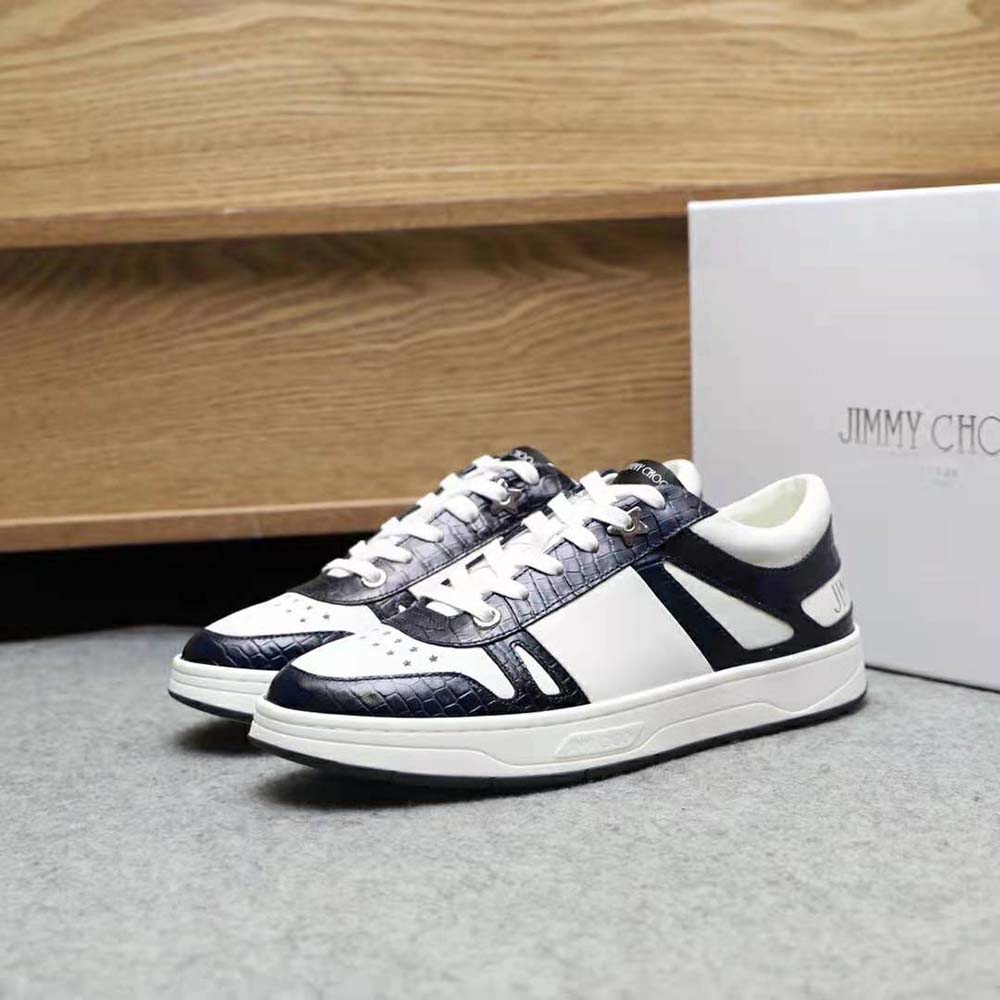 Overhead view showing laces and silver Jimmy Choo logo on trainers