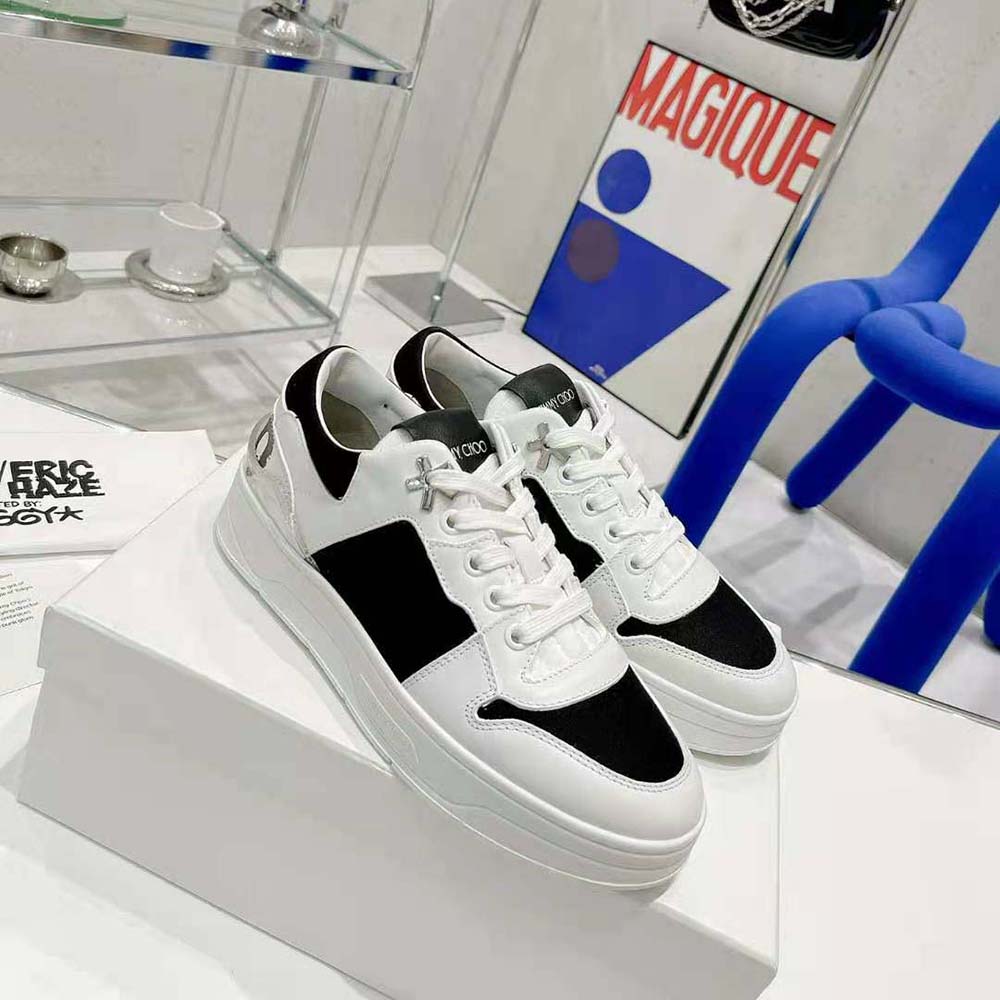 Top-down shot showing laces and Eric Haze signature detail on Jimmy Choo trainers