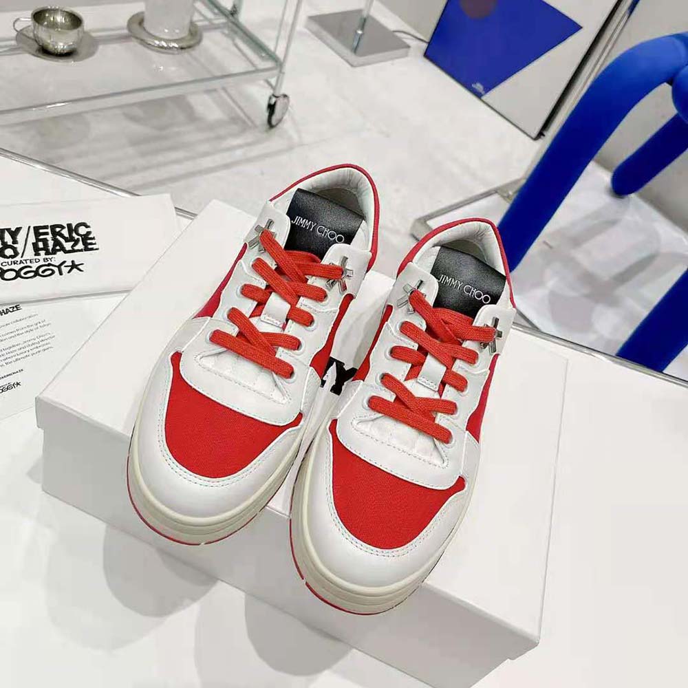 Close-up on red canvas and white calf leather detail