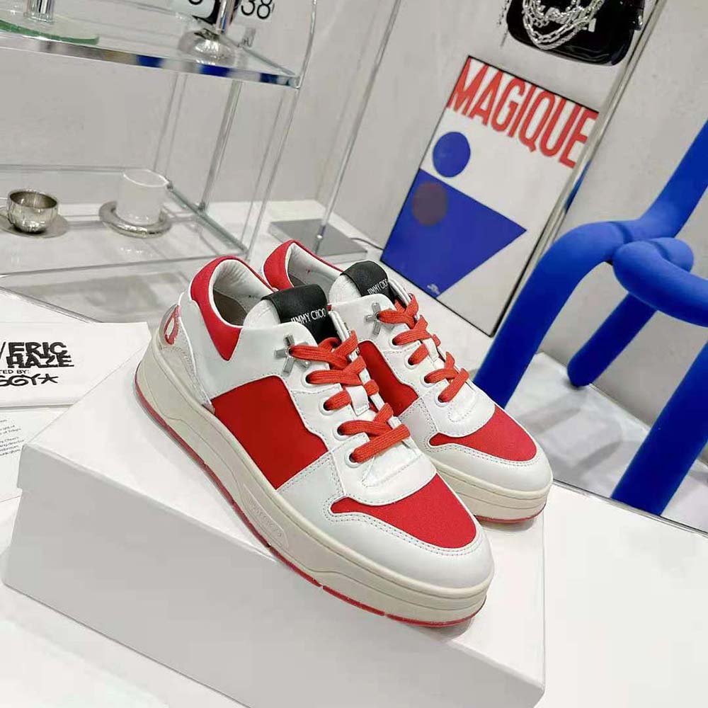 Side profile showing signature Eric Haze detail on trainers