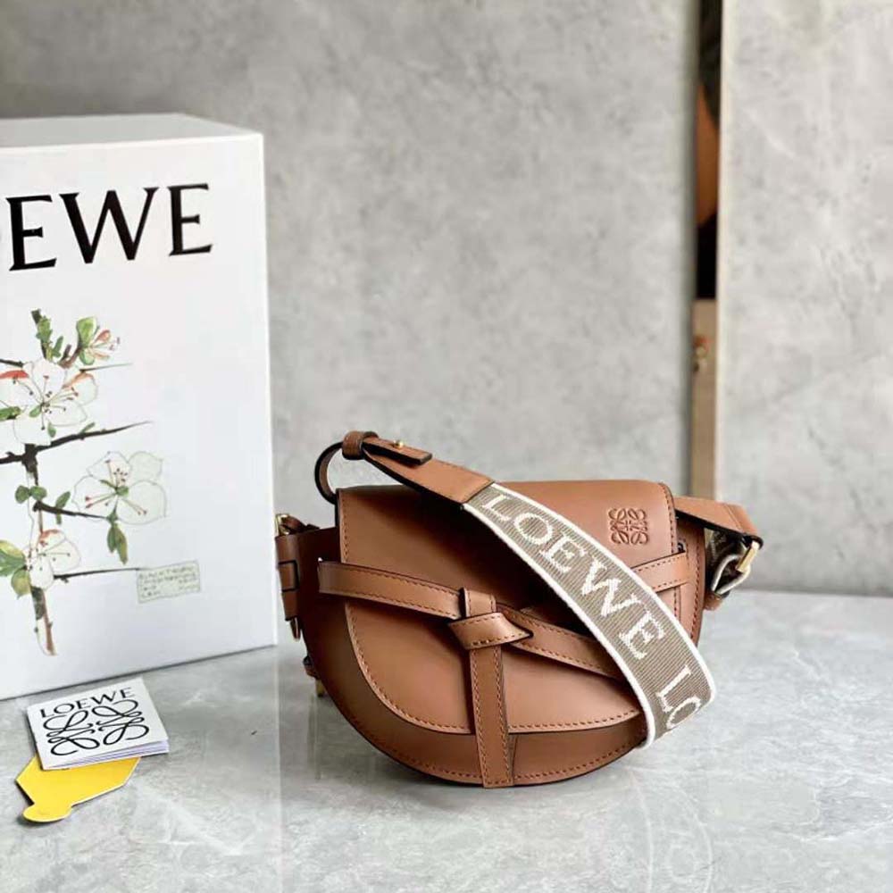 Side angle showing adjustable strap and dual compartments in Loewe Women Mini Gate Dual Bag