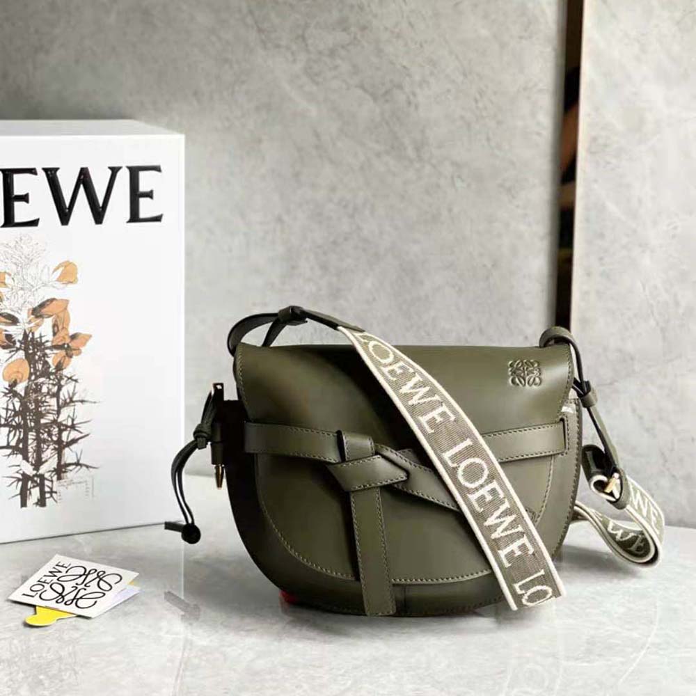 Close-up of polished gold Gate clasp on Loewe Women Small Gate Bag