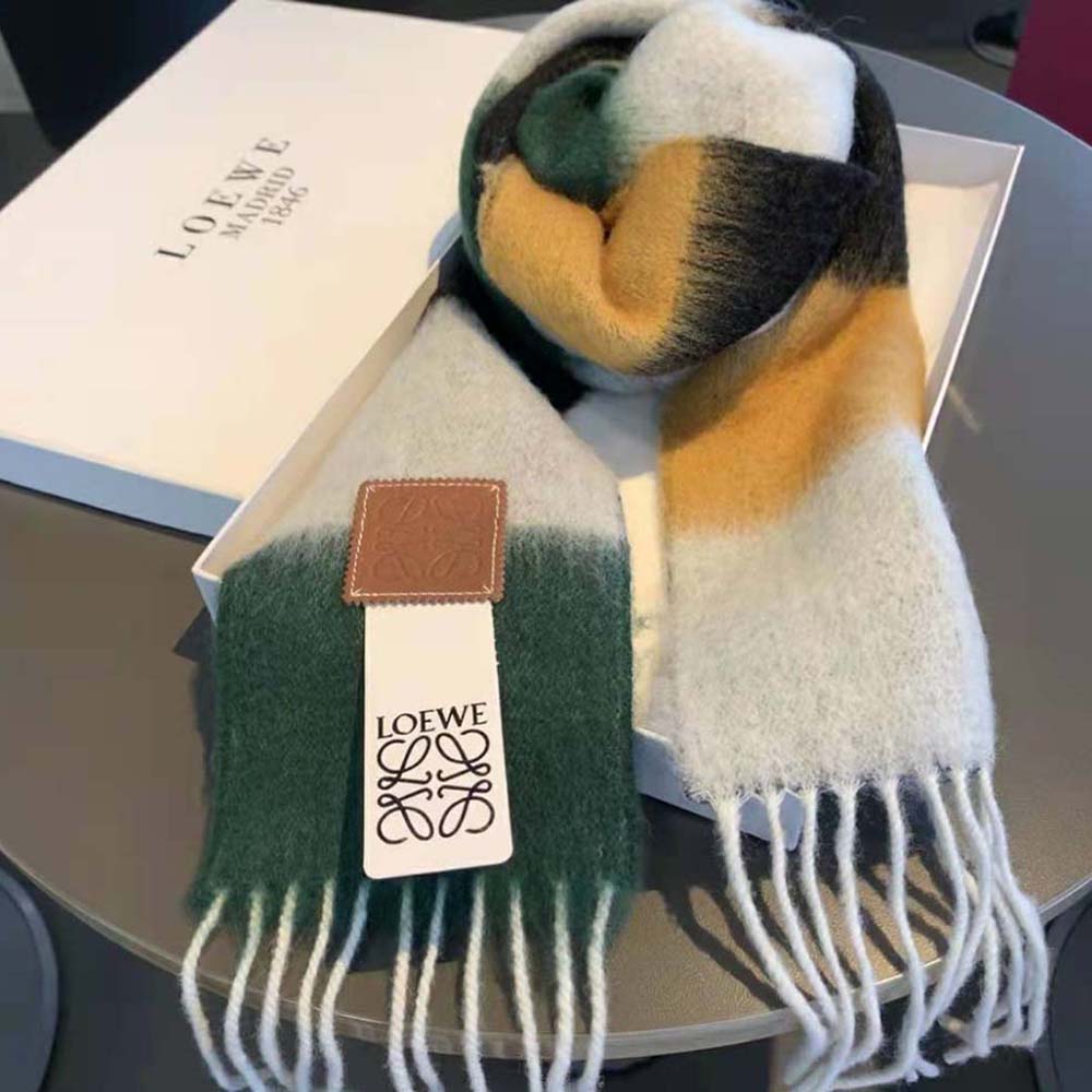 Close-up of soft mohair texture and Loewe signature on scarf