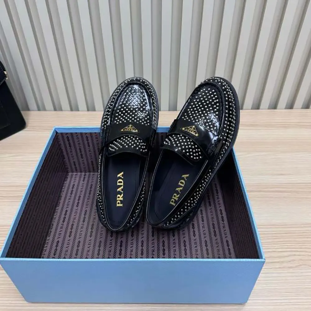 Top-down angle showing satin texture on Prada Women Chocolate Loafers