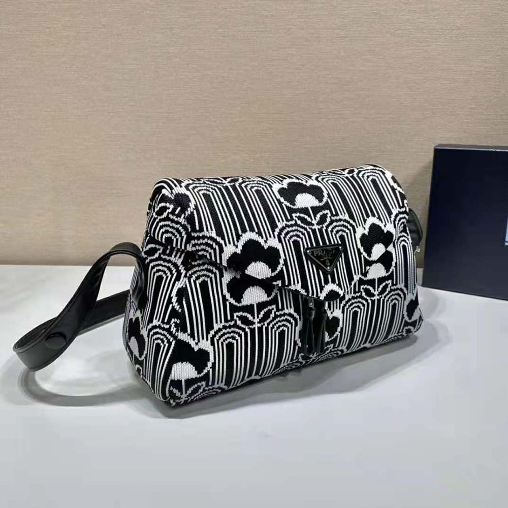 Side angle showing jacquard knit texture of Prada Signaux Bag-Black