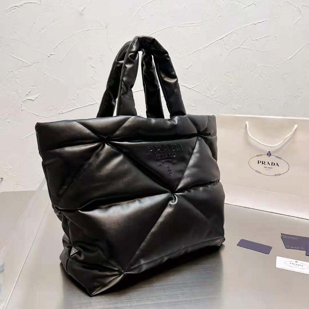 Close-up on Prada Women Padded Nappa Tote Bag-Black metal logo hardware
